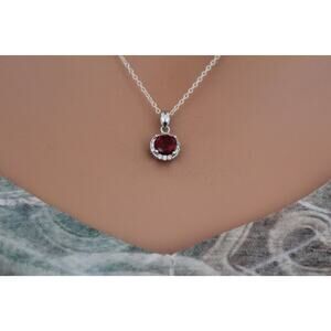 Sterling Silver Red Round CZ Pendant Circled in Clear CZ Stones Necklace